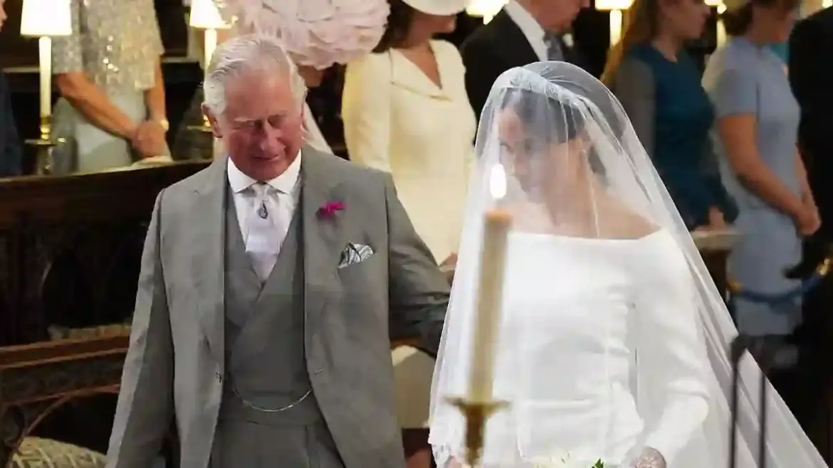 Prince Charles walks Meghan Markle down the aisle at Windsor Castle after her father Thomas Markle withdraws from royal wedding