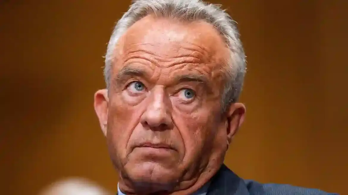 Robert F Kennedy Jr faces tough questioning from senators in Washington while internet users compare his tanned appearance to Mel Gibson