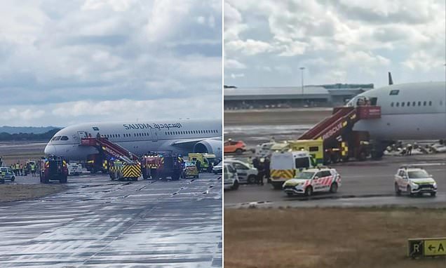 Police arrest unruly passenger who punched a crew member and tried to open cabin door on Saudia Airlines flight at London Heathrow Airport