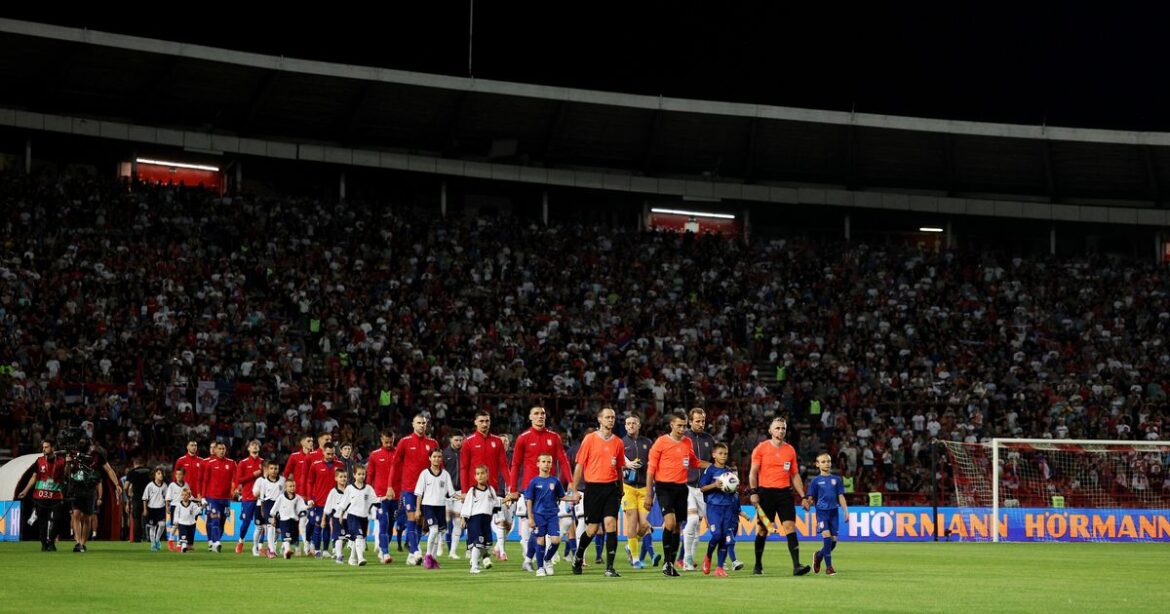 Referee halts England’s World Cup qualifying clash as Serbian crowd target Three Lions players with lasers in Belgrade