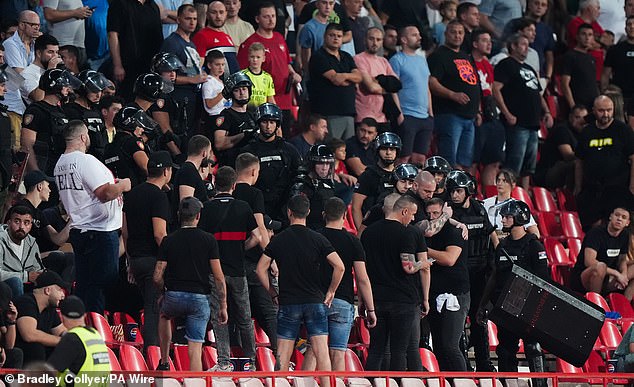 England secure dominant 5-0 World Cup qualifying win in Belgrade while Serbian fans clash violently in stands