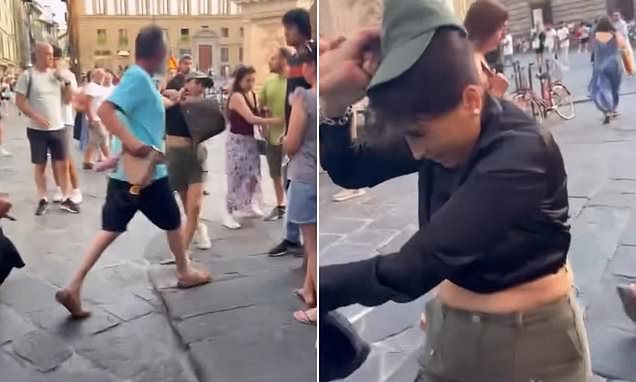 Furious husband grabs suspected pregnant pickpocket by the hair and stops her from stealing his wife’s backpack in Florence Italy