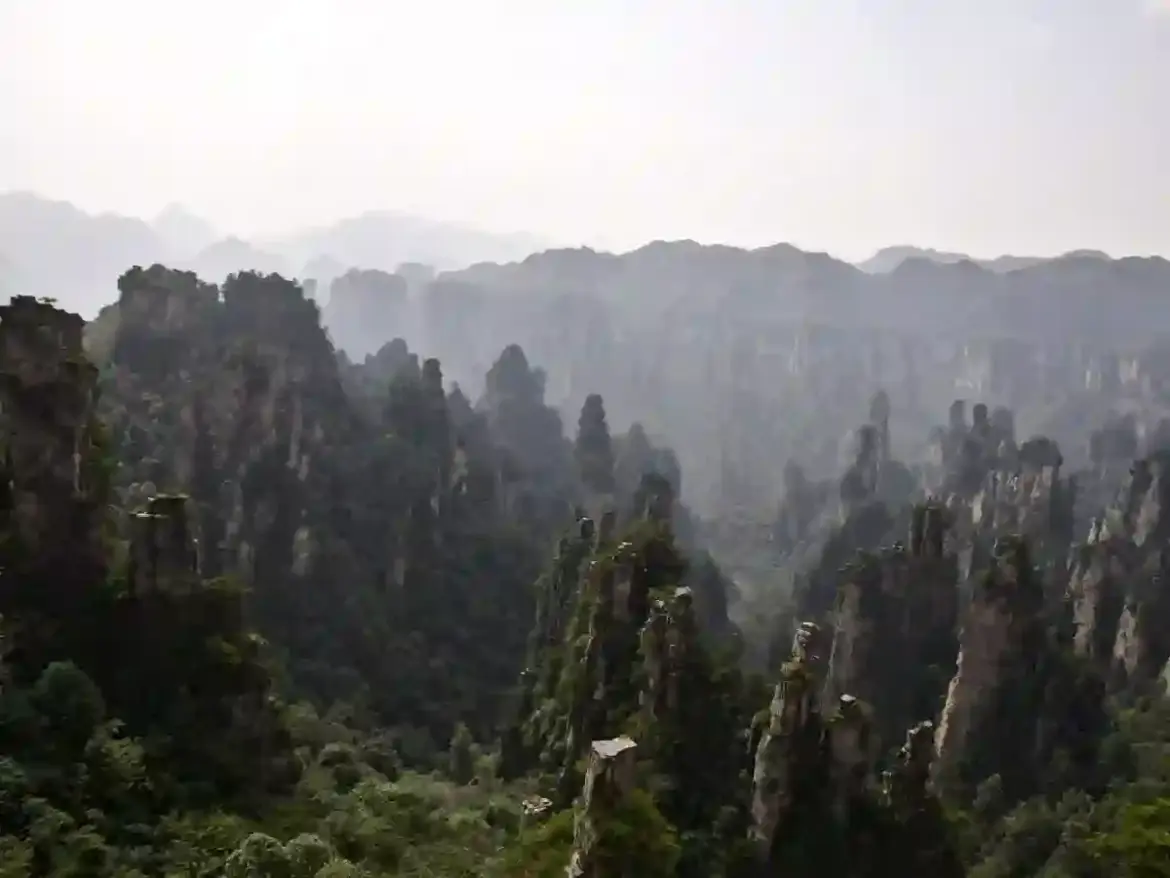 China’s Zhangjiajie National Park mesmerizes travelers with towering quartzite pillars and misty valleys in Hunan Province