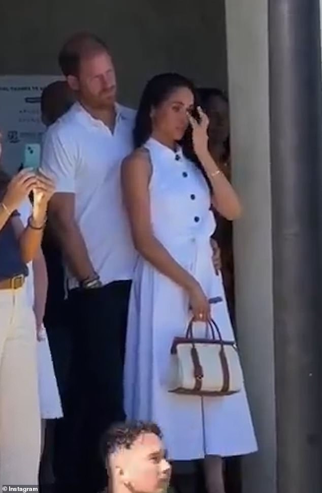 Meghan Markle wipes away tears while joining Prince Harry at an emotional charity tennis event in California honoring her close friend’s late son