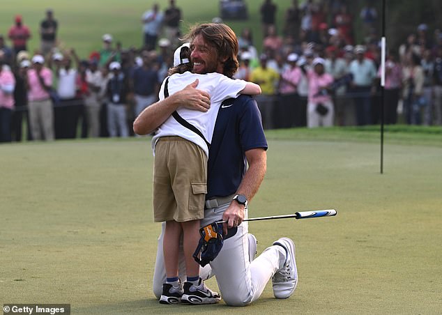 Tommy Fleetwood rallies from behind to win tournament in New Delhi with inspiring finish in front of family and young son