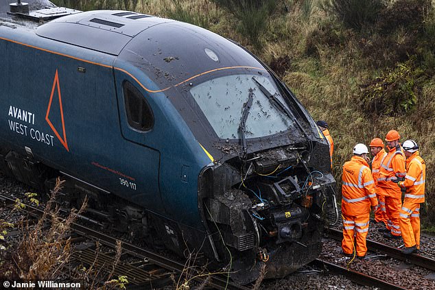 High-speed train derails after landslide hits tracks in Cumbria causing major travel disruption across northern England