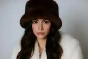 Fashion Designers Bring Back Fluffy Faux-Fur Hats on Winter Streets Across the United States