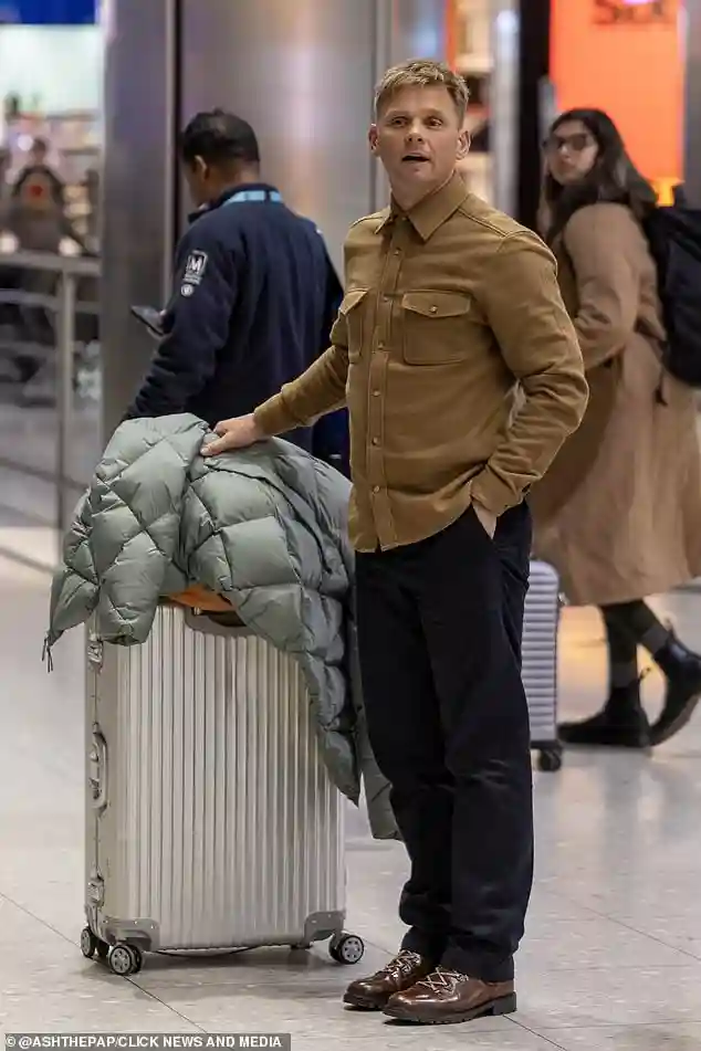 Jeff Brazier steps out at Heathrow Airport as the TV presenter quietly confirms his marriage breakdown in Iceland after a difficult summer in London