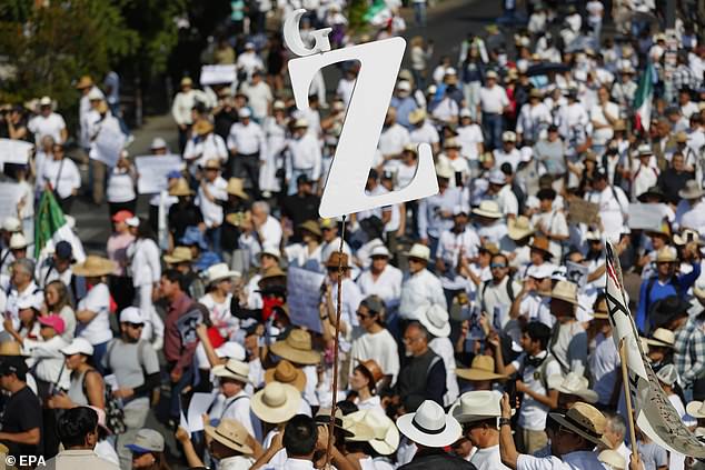 Thousands of Gen Z protesters march against corruption and cartel violence at the National Palace in Mexico City demanding President Sheinbaum’s resignation