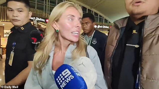 Bonnie Blue mocks starving dogs as she walks through Bali airport during controversial deportation