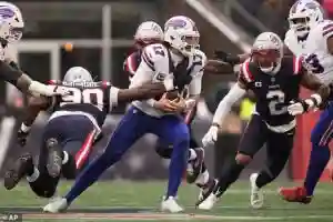 Josh Allen shrugs off being sick on the sideline as he leads Buffalo Bills comeback win over New England Patriots at Gillette Stadium