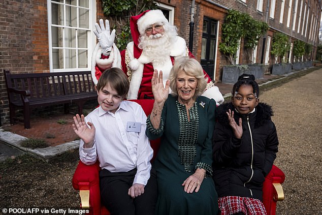 Camilla Welcomes Seriously-Ill Children to Decorate Christmas Tree and Meet Santa at Clarence House in London