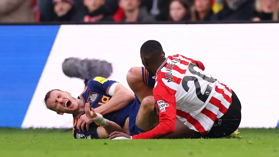Newcastle defender Dan Burn struggles to breathe and heads to hospital following brutal first-half clash in Sunderland derby at the Stadium of Light