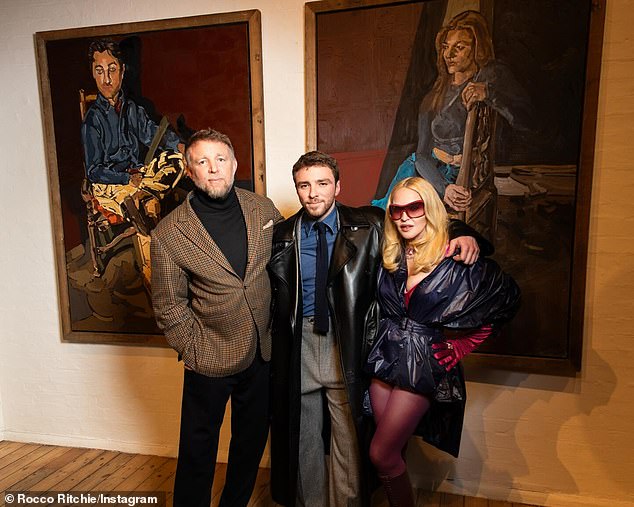 Madonna and her ex-husband Guy Ritchie reunite to support son Rocco at his art exhibition in London and delight fans with rare public appearance