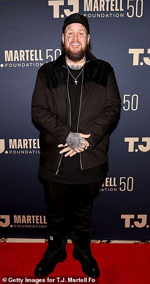 Jelly Roll opens up about his past struggle with intimacy as the singer recounts his 200-pound weight loss journey during a heartfelt conversation in Los Angeles