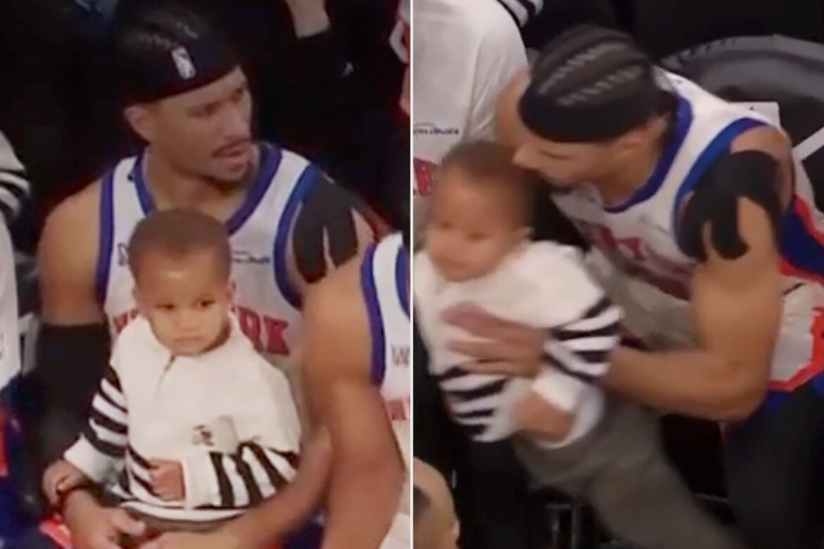 Josh Hart hurries back onto court with under 20 seconds left while Mitchell Robinson reacts to being handed one of Hart’s twin sons during Knicks win over Orlando Magic