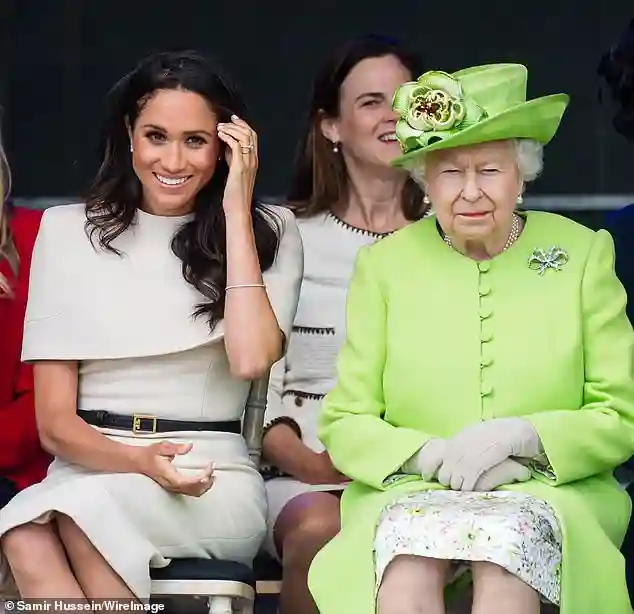 Queen Elizabeth II expresses disapproval over Meghan Markle’s expensive Dior gown and royal spending choices during official engagement in Morocco