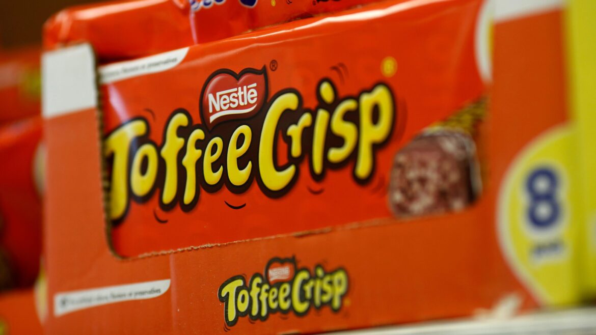 Nestlé announces that Toffee Crisp and Blue Riband bars are no longer classed as milk chocolate in the UK following recipe changes and rising cocoa costs