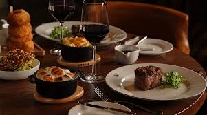 Young Londoners Celebrate a Free Gourmet Dinner Experience at a High-End Mayfair Steakhouse