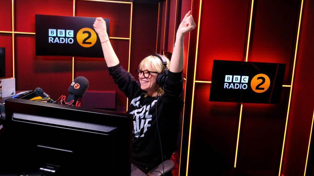 Zoe Ball announces she is stepping away from her Saturday BBC Radio 2 show as Emma Willis prepares to take over the weekend slot in London