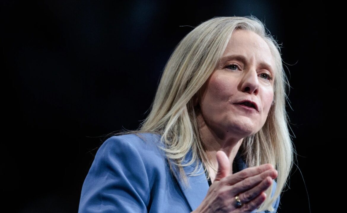 Virginia Governor Abigail Spanberger faces fierce backlash from conservatives after signing sweeping policies on immigration and workplace inclusion