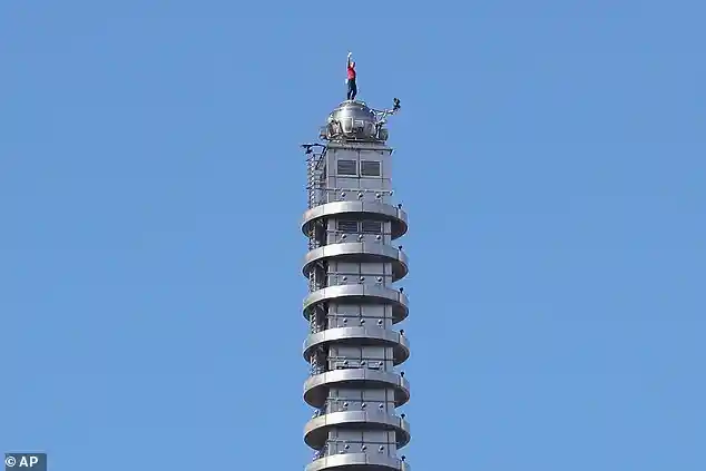 Alex Honnold completes daring ropeless climb up Taipei 101 skyscraper thrilling fans and spectators in Taiwan