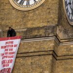 Iran Protester Scales London's King’s Cross