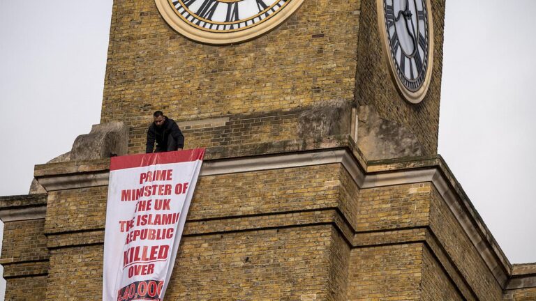 Iran Protester Scales London's King’s Cross