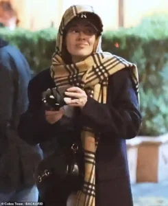 Adele Steps Out in Rome in Stylish Winter Ensemble While Her Album 21 Surpasses Whitney Houston’s The Bodyguard in Global Sales