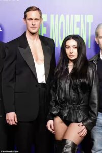 Charli XCX and Alexander Skarsgard Steal the Spotlight with Daring Outfits at The Moment Premiere in Londonv