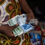 Dollar to Naira black market rate climbs as Lagos operators struggle to meet growing demand for US dollars in Nigeria