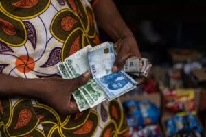 Dollar to Naira black market rate climbs as Lagos operators struggle to meet growing demand for US dollars in Nigeria