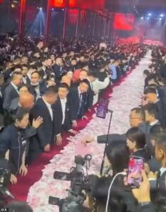 Henan Kuangshan Crane Co. stuns employees by handing out 26 million dollars in cash at annual end of year party in China