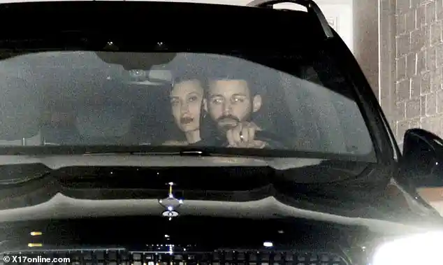 Justin Bieber parties with friends in Los Angeles after being shut out of all four Grammy Awards while Hailey Bieber heads home solo in a luxury SUV