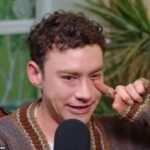 Olly Alexander reveals he abused his body and partied recklessly during teenage years while coming to terms with his sexuality in London