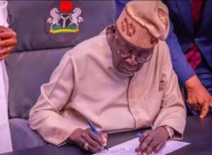 President Bola Tinubu signs Electoral Act Amendment 2026 to clarify electronic transmission as supplementary tool while sparking debate across Nigeria