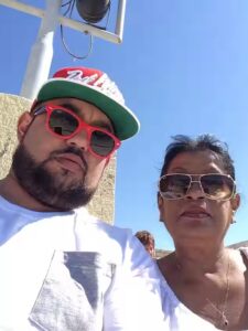 Police arrest Richard Clayton on suspicion of murdering his mother Angela Biggs at their Upton Park home in East London following heart surgery complications