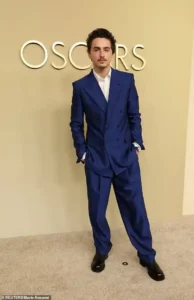 Timothée Chalamet Showcases Sapphire Blue Suit and Strengthens Oscar Campaign at Beverly Hilton Luncheon in Beverly Hills