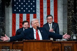 President Donald Trump challenges Democrats with pointed stand up moment during record-length State of the Union at the US Capitol in Washington DC