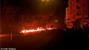 Iran Launches Missile Barrage Targeting Israel as Tehran Burns