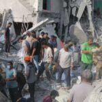 At least 148 dead after reported strike on school, Iran says