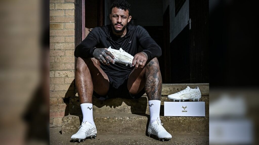 Courtney Lawes, the seasoned English rugby star, has long embraced the idea of growth and transformation, a philosophy symbolized by the moth tattooed on his neck—and now featured on his custom boots. “The moth represents resilience but also the ability to change and adapt,” he tells Daily Mail Sport. “It mirrors my career: evolving, improving, and learning from every experience.” At 37, Lawes remains a force on the field with French side Brive, having earned 105 England caps and five Lions appearances. His career longevity is rare in modern rugby, a testament to constant adaptation and dedication to maintaining peak performance. Lessons for England’s National Team Lawes’ perspective on evolution extends beyond his personal journey. Reflecting on England’s disappointing 2026 Six Nations campaign, he emphasizes that the national side must adapt, improve, and learn from mistakes. With only one win and a fifth-place finish, England conceded record points and tries, raising questions about coach Steve Borthwick’s risk-averse strategy. “The team can definitely still win the next World Cup,” Lawes insists. “But we need to solidify who our best players are and give them experience in high-pressure situations. There’s no substitute for that.” Young Talent and Changing Player Profiles Lawes points out a generational shift in English rugby, noting that younger players often have smoother lives and fewer hardships compared to previous stars. Players like Henry Pollock face different challenges than Lawes and Ellis Genge did in their youth. For him, overcoming adversity shaped resilience and mental toughness—qualities he believes are crucial for the next England squad. The recent national Under-18 championship victory by Northampton School for Boys, Lawes’ alma mater, highlights the importance of broadening talent development beyond fee-paying schools. “It’s bigger than rugby,” he says. “It shows that a wider talent pool can succeed and enrich English rugby.” Looking Ahead: Coaching and Strategy Lawes encourages Borthwick to embrace a more attacking style, citing the thrilling 48-46 defeat by France as a blueprint. “Rugby is changing globally,” he notes. “Teams are playing more attacking rugby, and England must adapt to remain competitive. Risk-taking, innovation, and learning from setbacks are essential.” He also supports retaining Ollie Chessum at No 6 as England prepares for the Nations Championship opener against back-to-back World Cup winners South Africa in July. Continuing His Own Career Despite contemplating retirement, Lawes remains committed to playing. He is in talks to extend his contract with Brive for a final season, aiming to finish his career at exactly two decades. Offers from Leicester were considered but did not align with his goals. “I’m still performing at a high level and want to finish on my own terms,” he says. Impact and Consequences Lawes’ career longevity and adaptability provide a model for younger players and the England team. His insights highlight how resilience, experience, and exposure to adversity are critical to player development. England’s performance in the Six Nations also serves as a warning: without evolution and willingness to change tactics, even historically strong teams can falter. What’s Next? For Lawes, the next year will focus on one final season with Brive while mentoring younger talent. For England, the challenge lies in adjusting coaching strategies, cultivating depth across the squad, and preparing a more attack-oriented approach for the upcoming international fixtures. Summary Courtney Lawes’ career embodies adaptability, resilience, and continuous growth. As England rebuilds after a tough Six Nations, his lessons on evolution, risk-taking, and player development resonate strongly. Lawes is determined to play one last season in France, leaving a lasting legacy both on and off the field. Bulleted Takeaways Courtney Lawes’ moth tattoo symbolizes resilience and career evolution At 37, he continues playing professionally with Brive, after 105 England caps England’s 2026 Six Nations campaign highlighted the need for tactical evolution Lawes advocates for a more attacking style and exposure to adversity for younger players Northampton School for Boys’ Under-18 championship victory shows talent can thrive outside fee-paying schools Encourages retention of Ollie Chessum at No 6 and risk-taking in strategy Lawes considers one final season with Brive to round off a 20-year career