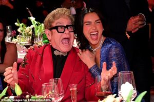 Elton John Welcomes Dua Lipa to Glamorous Oscars Charity Party in London