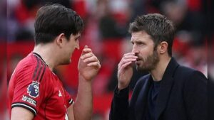 Harry Maguire and Michael Carrick