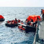 Sri Lanka Navy personnel assist Iranian sailors