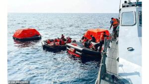Sri Lanka Navy personnel assist Iranian sailors