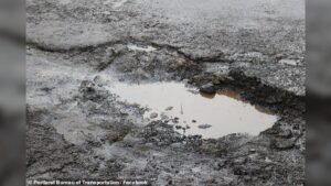 Portland Mayor Keith Wilson pushes controversial road repair tax plan that forces residents and businesses to pay new monthly utility fee in Portland Oregon