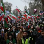 Iranian protesters celebrate Khamenei’s death while marching through London streets
