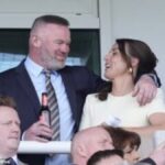 Coleen Rooney Stuns Crowd as She Embraces Wayne Rooney at Grand National Event in Aintree Racecourse Merseyside