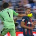 Real Zaragoza goalkeeper Esteban Andrada punches Huesca defender Jorge Pulido during violent Aragon derby clash in Spain as match descends into chaos